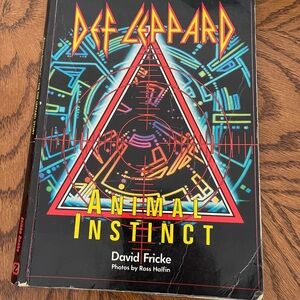 Def Leppard Animal Instinct Hardcover Book - Black with Multicolor Artwork